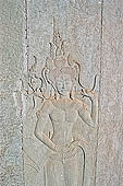 Angkor Wat temple, third enclosure, devatas sculpted in bas-relief with an extraordinary variety of intricate hair styles and costumes. 